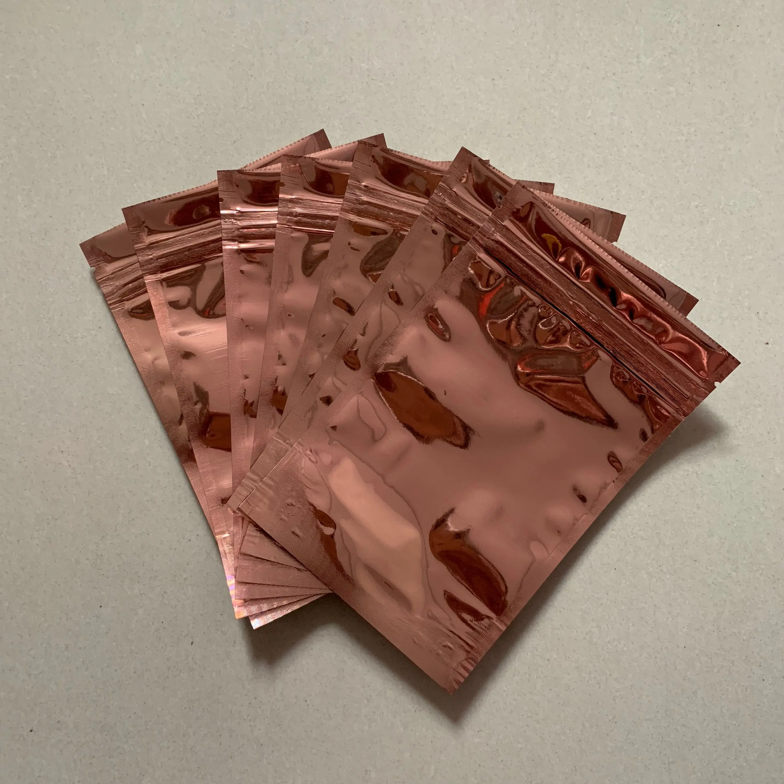 
Custom rose gold color packaging plastic ziplock bag 