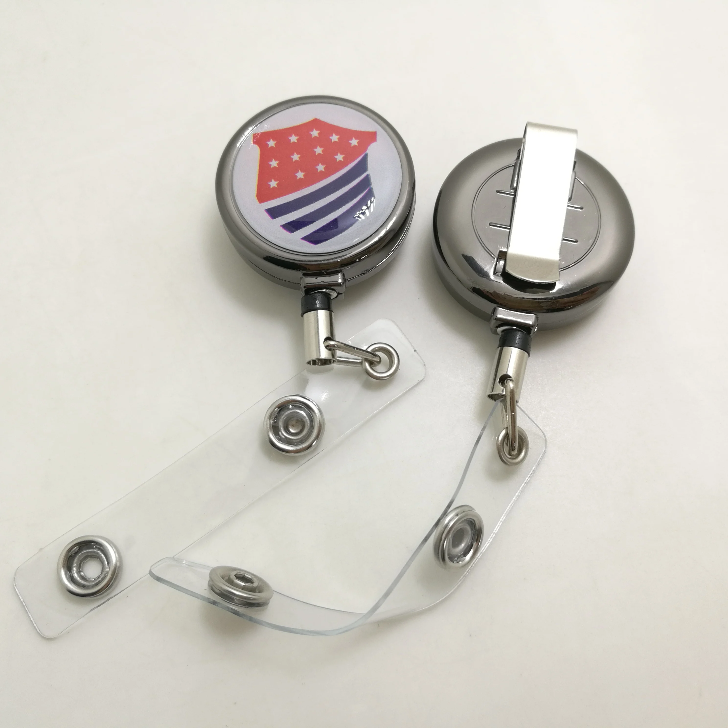 black  metal badge reel with epoxy dome sticker