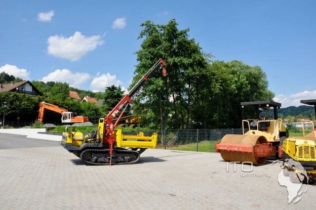 MST-1500VD full rubber crawler carrier with crane and wood grapple