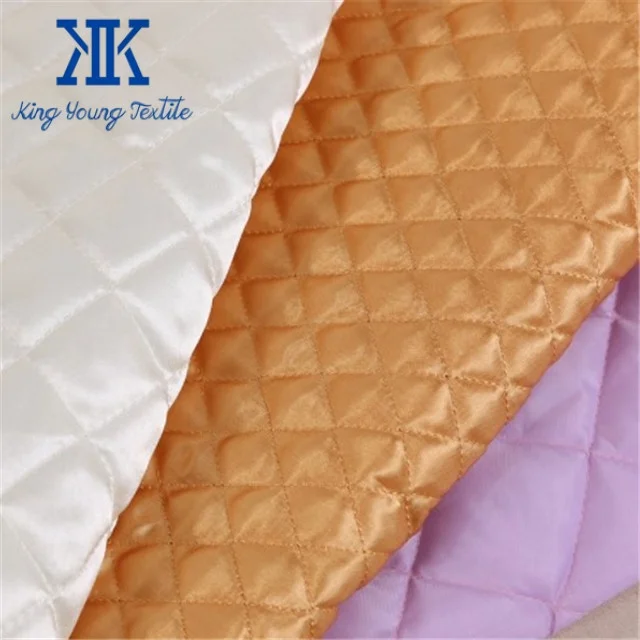 700 colors available low MOQ high quality luxury diamond quilted shiny polyester satin silk fabric