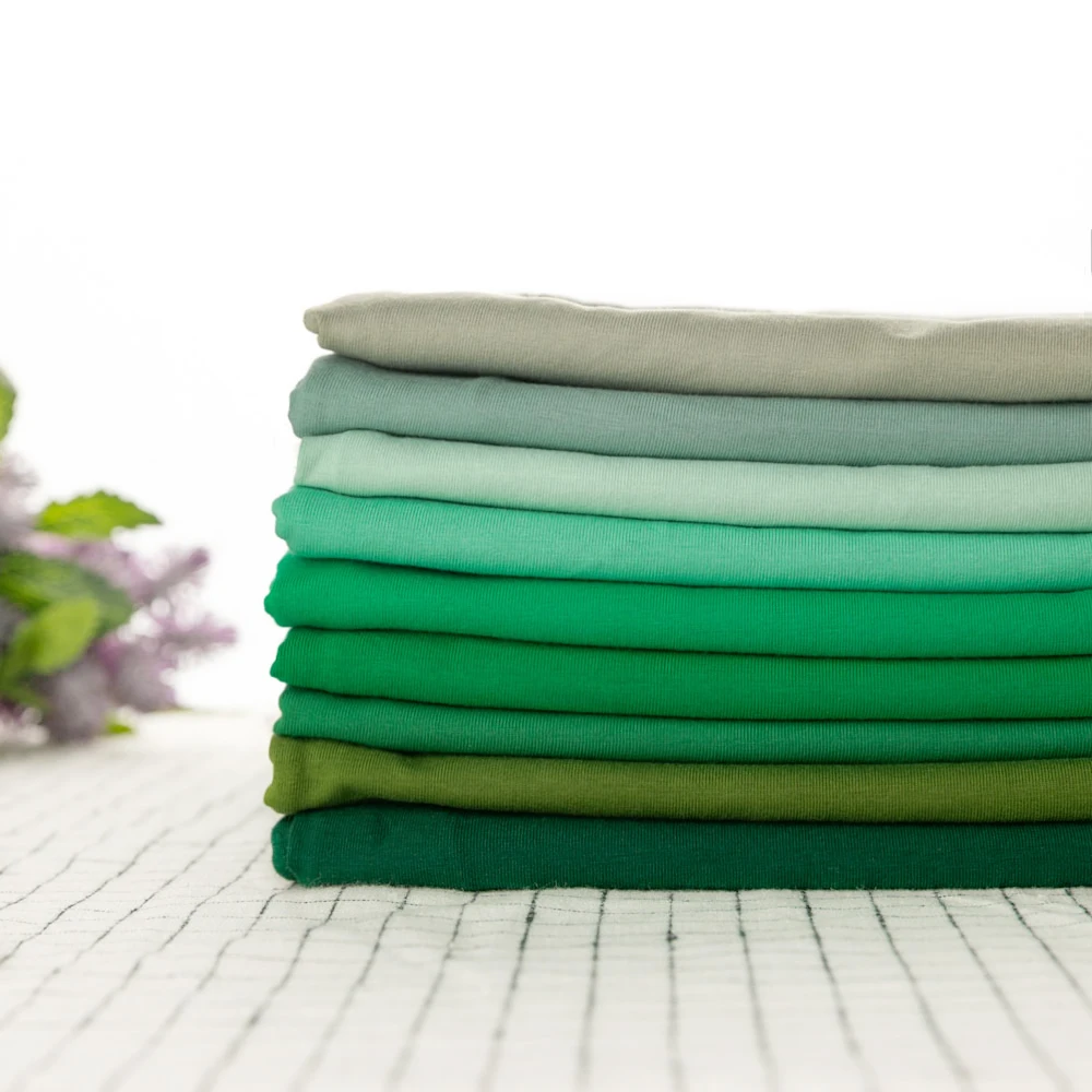 
4 ways stretch eco plain dyed Green Series solid color 95 cotton 5 spandex single jersey knit fabric 