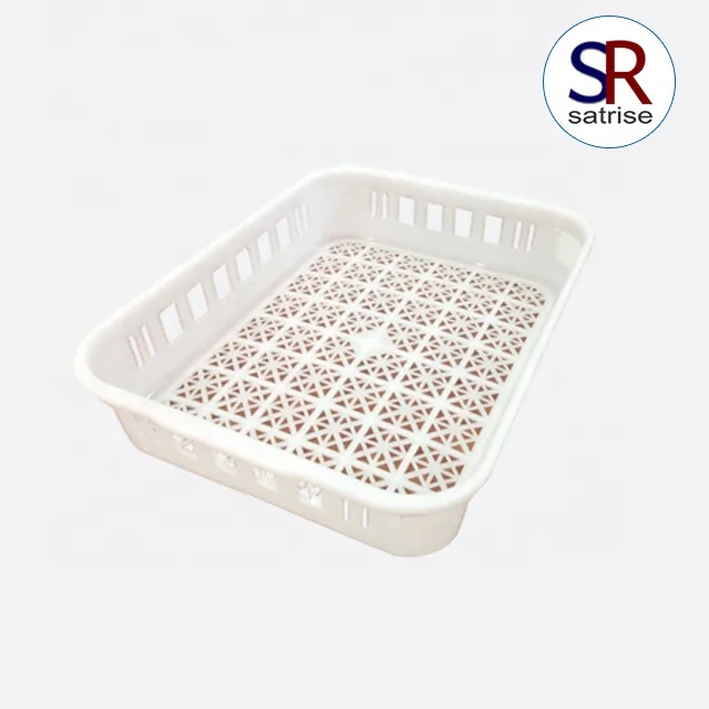 
Square hard plastic trays serving mushroom bottles 
