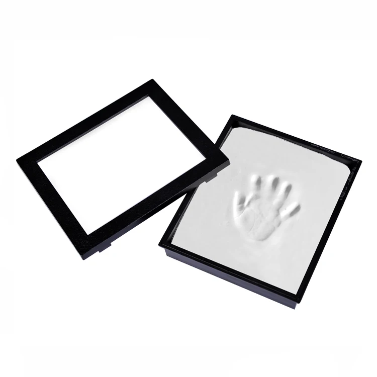 Прекрасный ребенок handprint пластиковая глиняная рамка