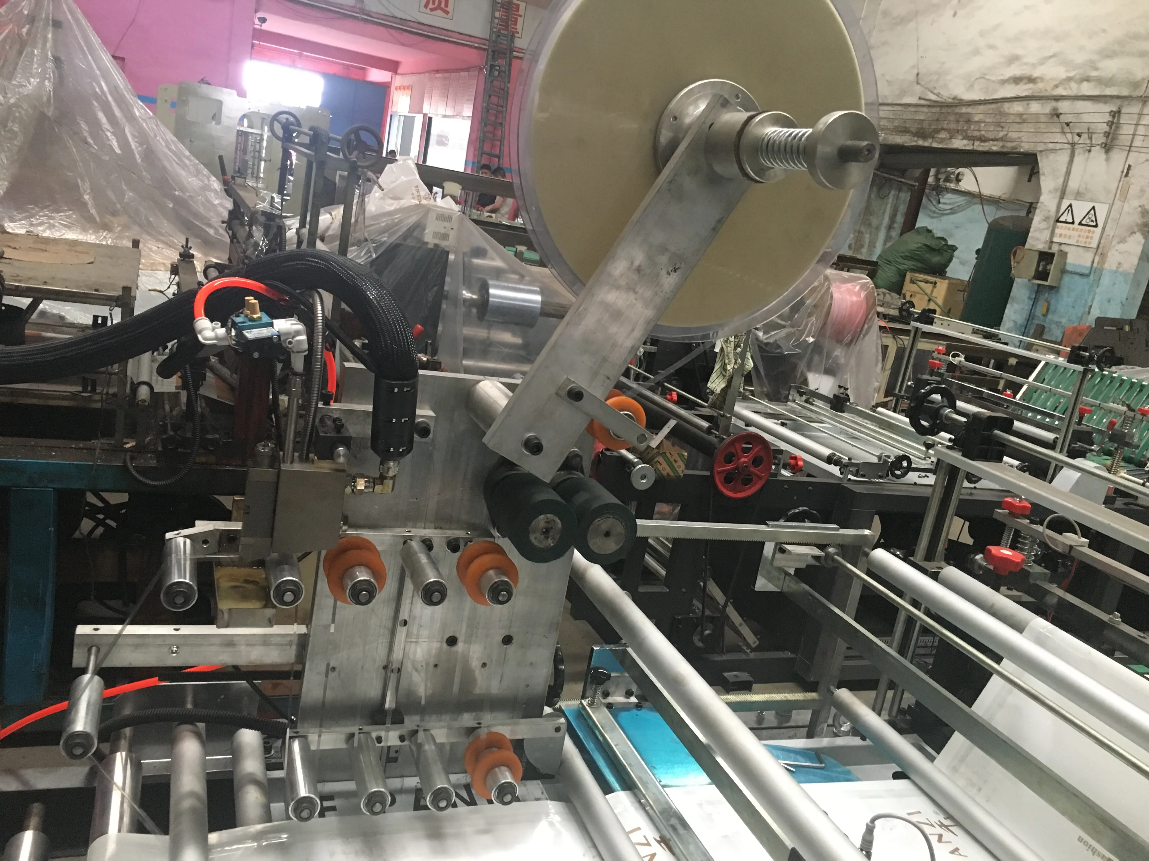 
EMS/DHL/SF/TNT courier bag making machine 