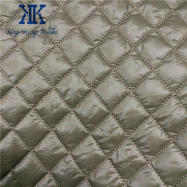 300T oil cire dwr coated nylon taffeta fabric quilted with 120gsm polyester padding for winter coat