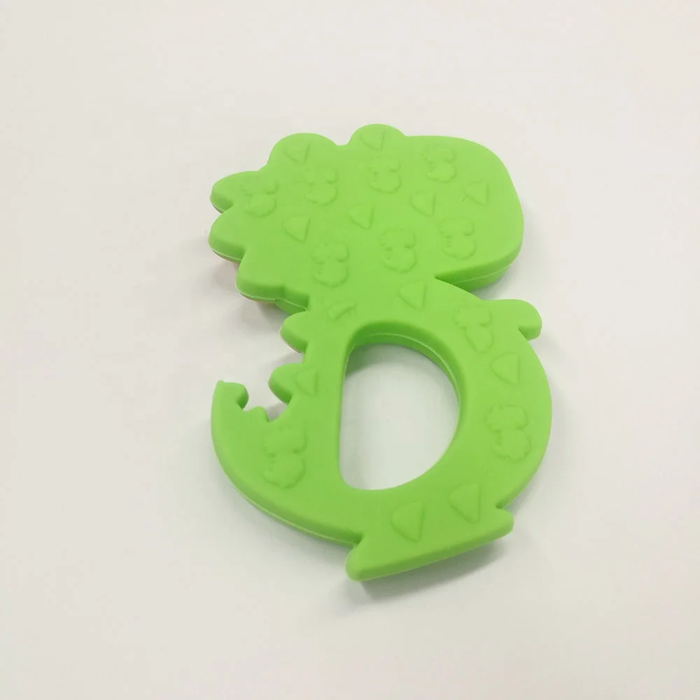 Wholesale customized colorful dinosaur food grade silicone teether child baby chew teething ring toys