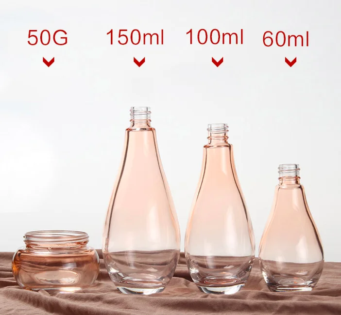 High end free sample 60ml 100ml 150ml bowling ball shape glass lotion bottle with gold pump for body face lotion