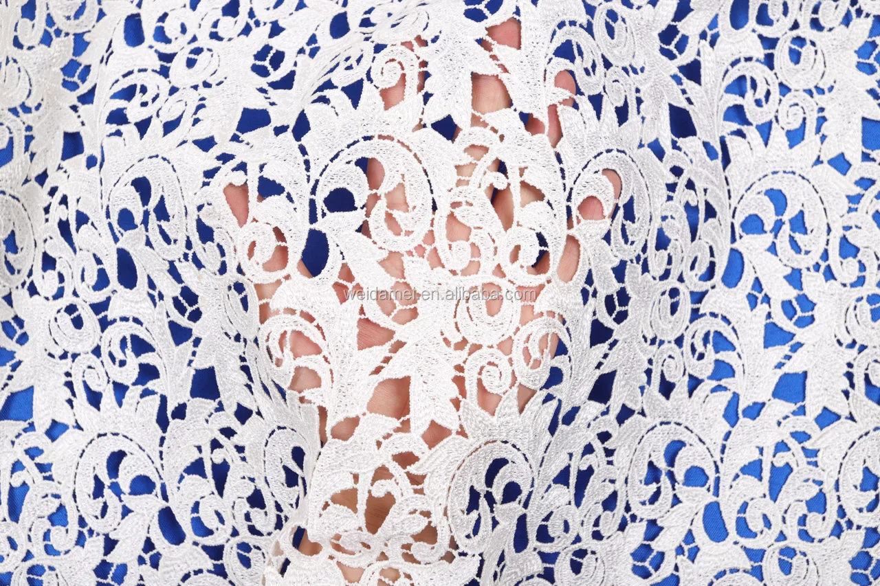 
New Arrival Chemical Cord Lace Fabric White Milk Silk Embroidery Wholesale Guipure Lace Fabric for Wedding Dress 