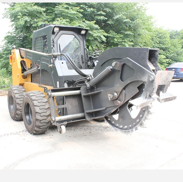Skid steer loader rock saw trencher