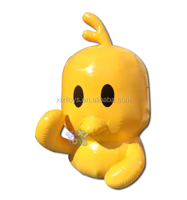 Large inflatable strawberry balloon on ground, advertising fruit inflatable character cartoon