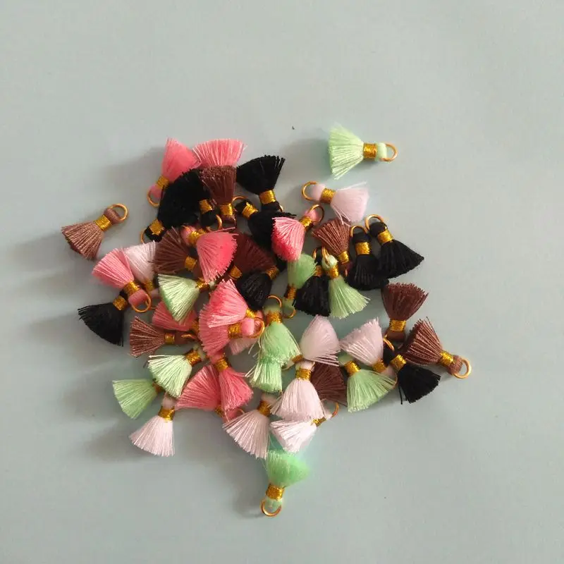 factory custom free sample 700 colors 1.5cm mini cotton tassels for jewelry ,tassel cotton with golden ring