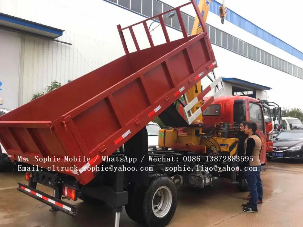 sinotruck RHD howo dump truck with crane 6 wheel dump truck load volume capacity for sale in dubai