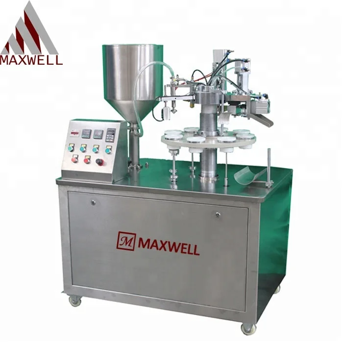 Трубы вставить и кремовой начинкой и запечатывания упаковки машина