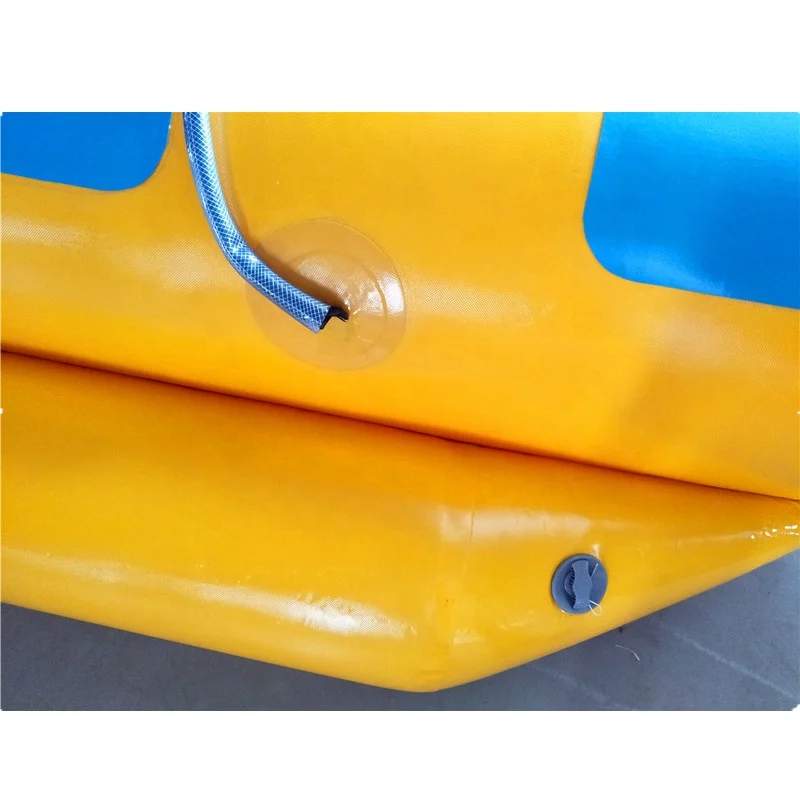 
Inflatable yellow banana boat for 4 seaters. 