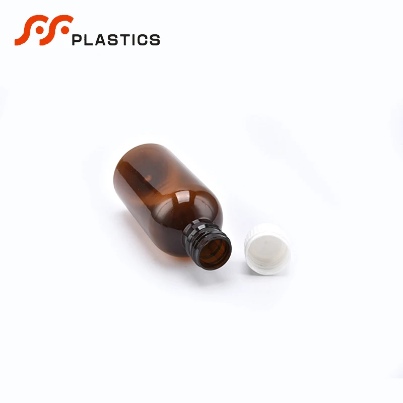Food grade medical safe seal liquid packaging amber bottle factory wholesale measuring cup cough syrup brown plastic bottle
