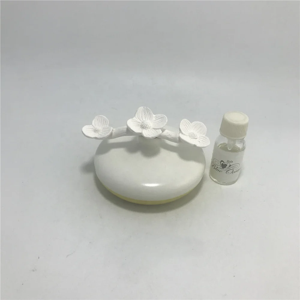 Plum blossom ceramic essential oil diffuser bottle for female
