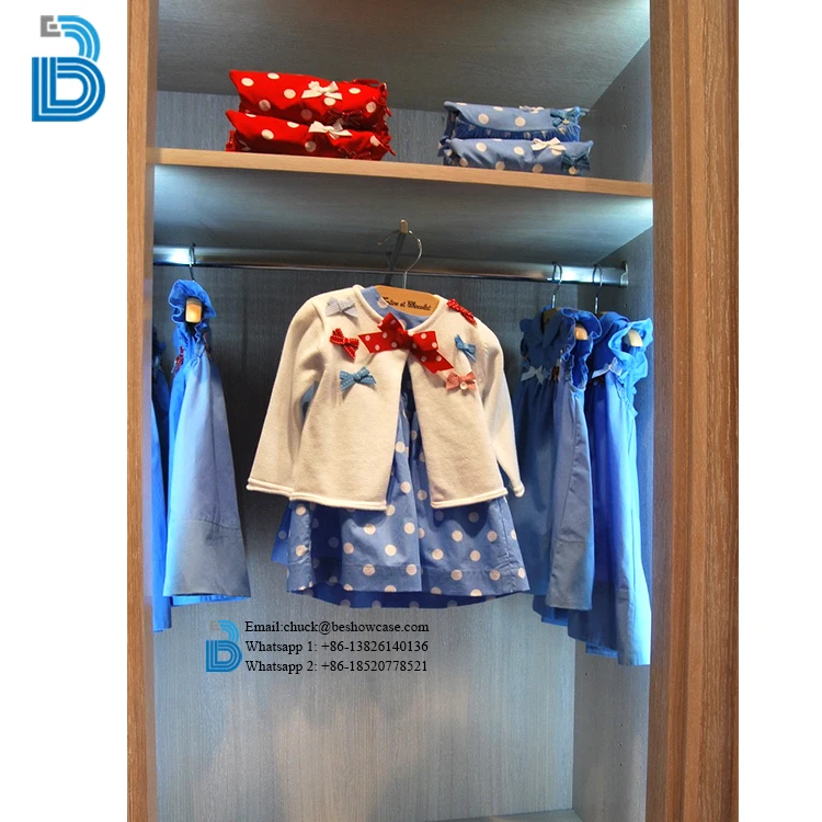 Children clothing shop kids store display fixtures design decoration with metal racks