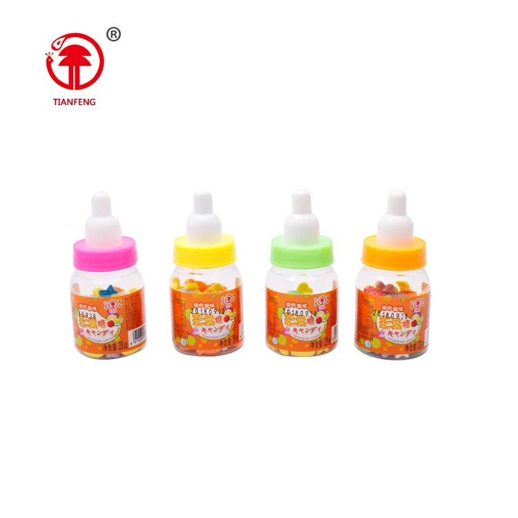 Confectionery toys hard press candy sweet halal chinese table press crayon candy with nipple packing