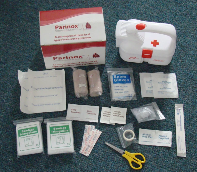 
first aid kit with medical items for household safety 