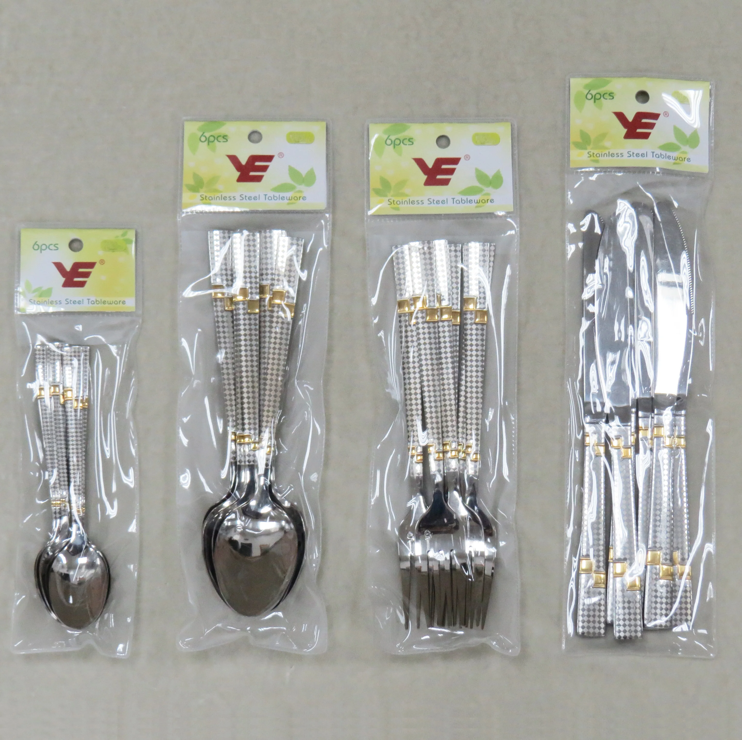 6pcs stainless steel cutlery set with Gold and Laser pattern in plastic bag with tie card for supermarket