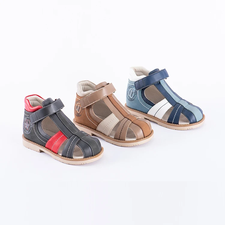 Fashionable style girls and boys sandals and orthopedic leather shoes