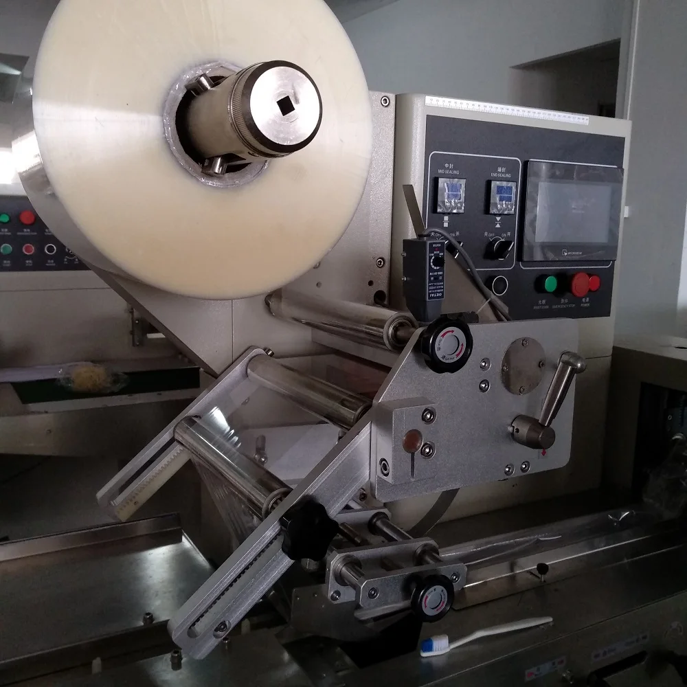 Automatic low cost plastic pouch book / a4 paper packing machine