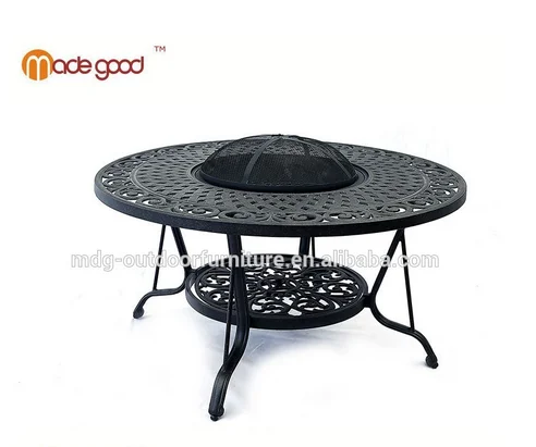 dining table with fire pit in middle  outdoor table  fire table