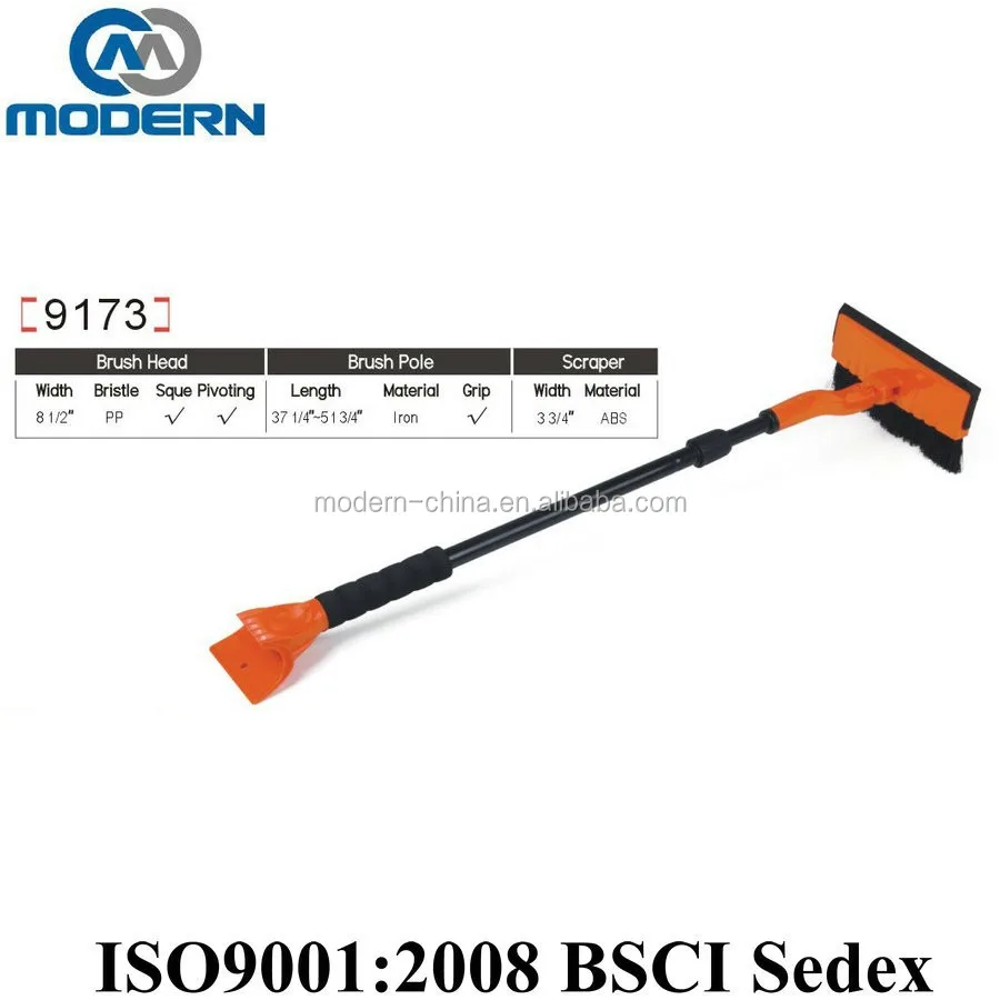 Telescopic snow brush with scraper