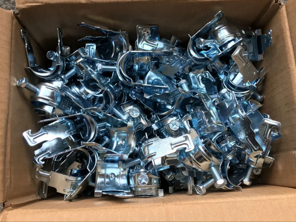 Universal one piece strut clamp, conduit clamp