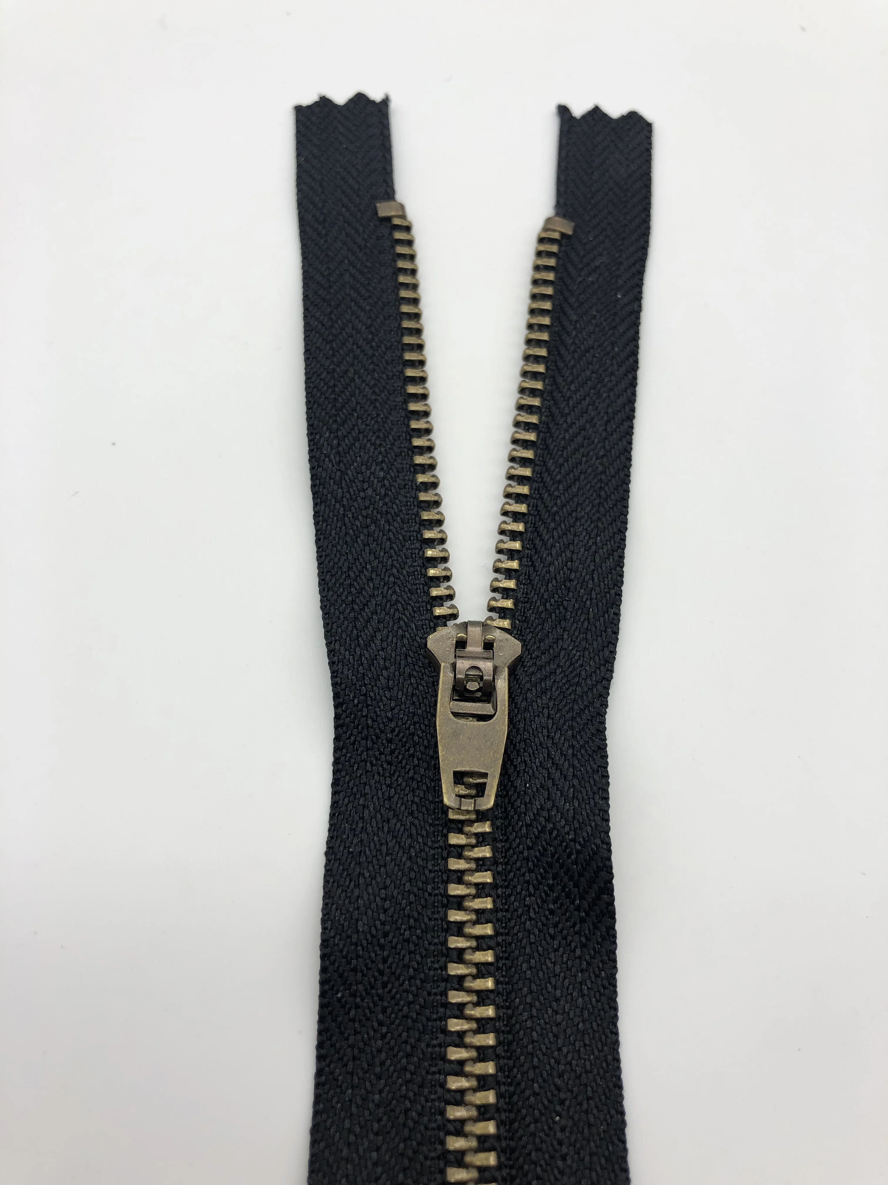 cheap brass metal yg zipper 15cm for jean pant
