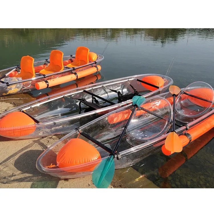 2 person sit in clear bottom kayak
