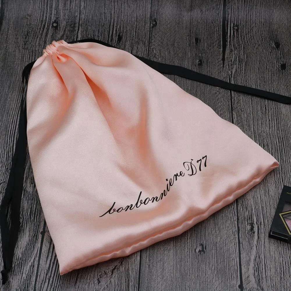 Pink satin bags for hair extensions with logo printed