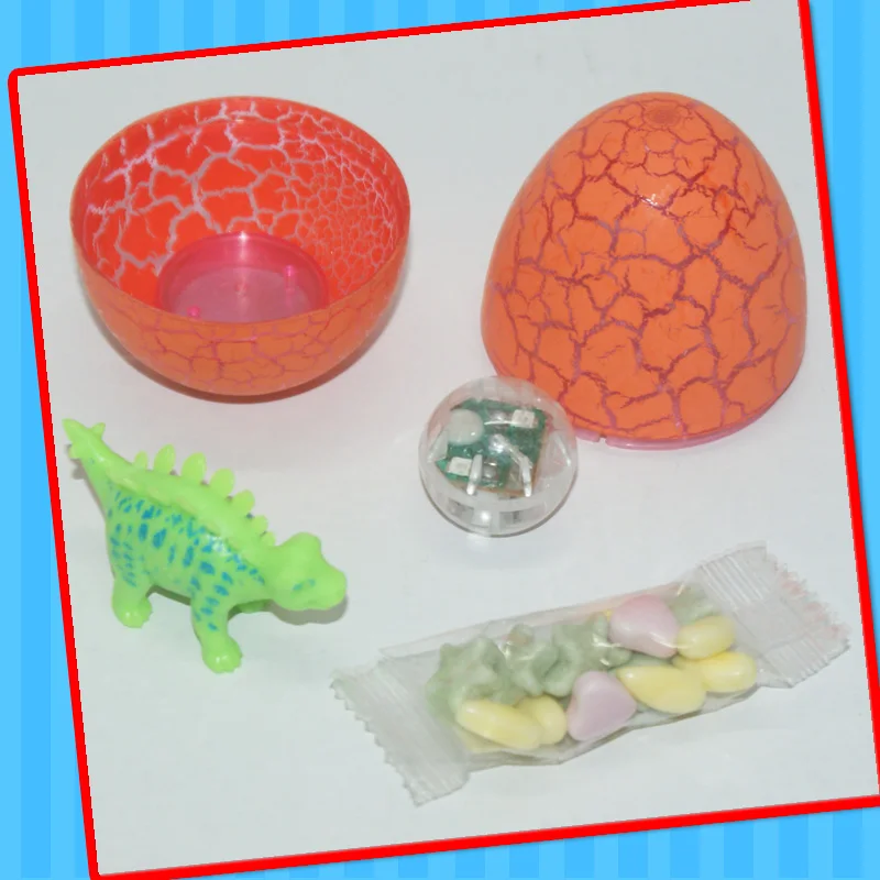 Good quality plastic dinosaur egg toy with candy China supplier of Shantou dinosaur egg with light for kids