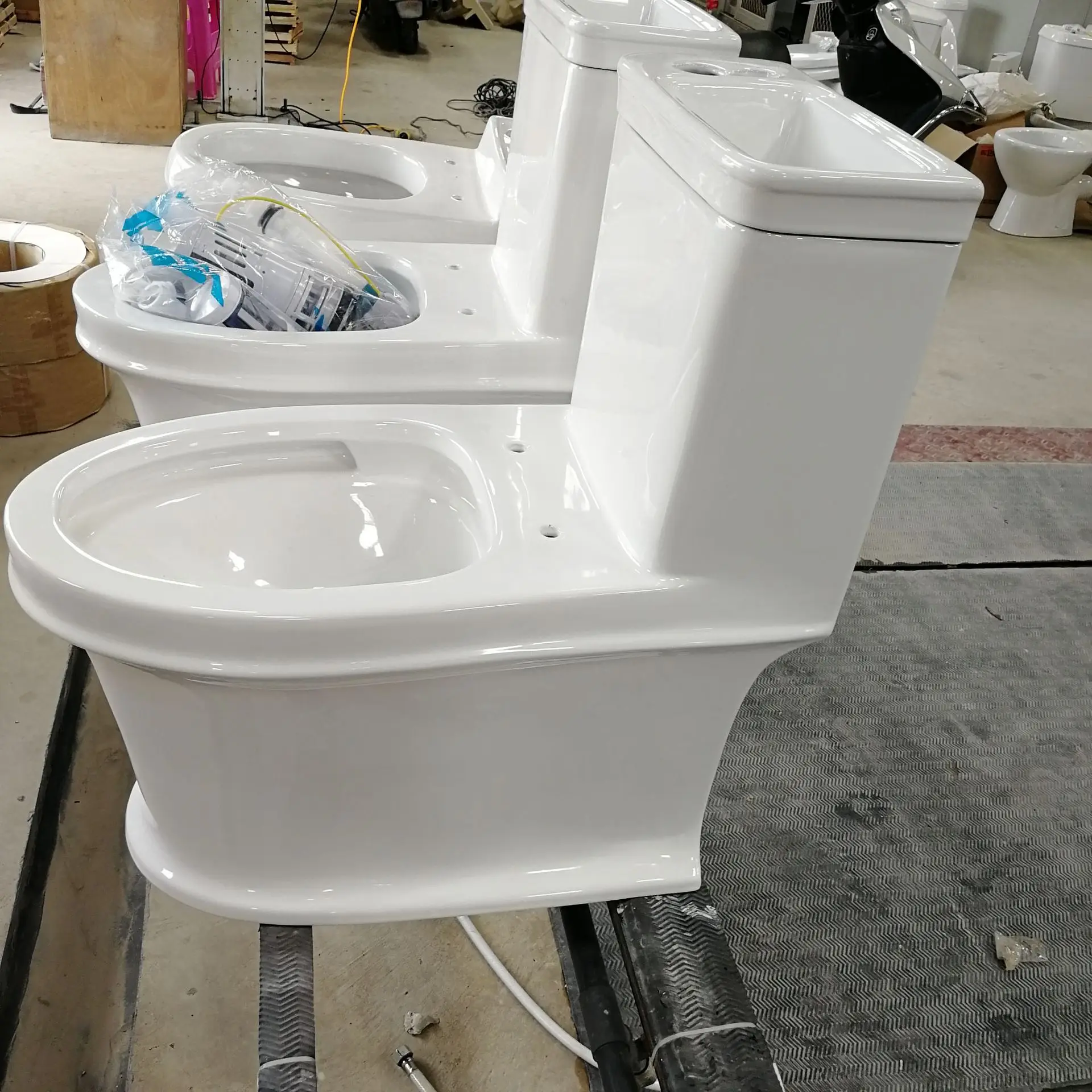 Good Quality Water Saving Model One Piece Toilet with Washing Hand Function