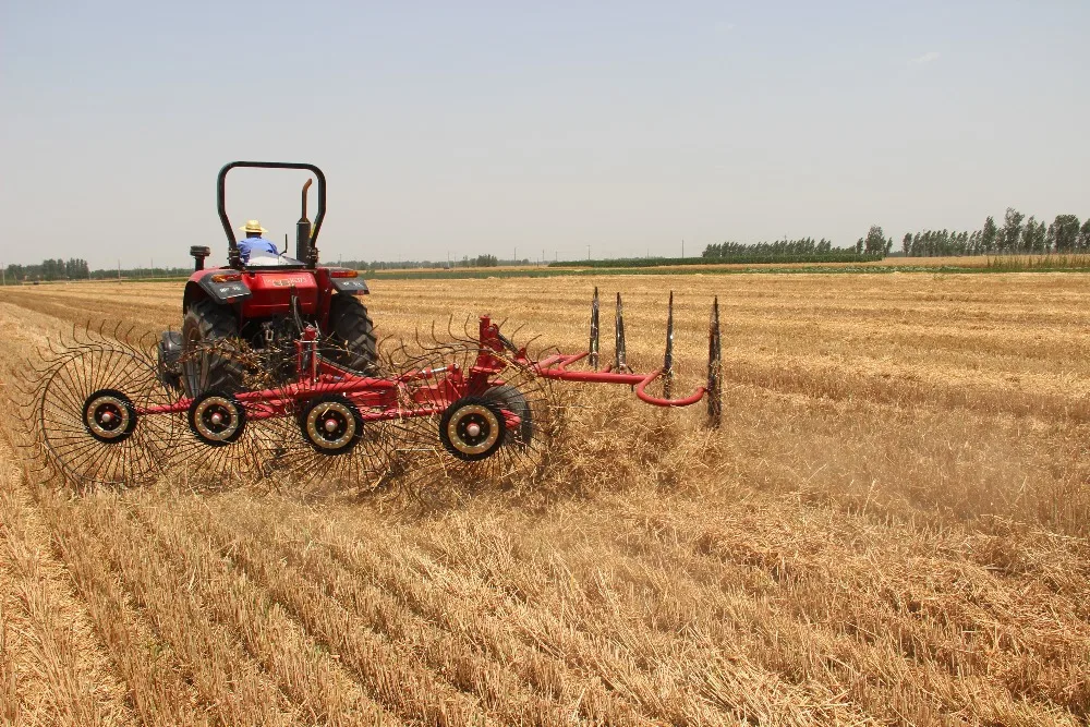 
China cheap price mini agricultural hay finger wheel rotary rake machine for sale 