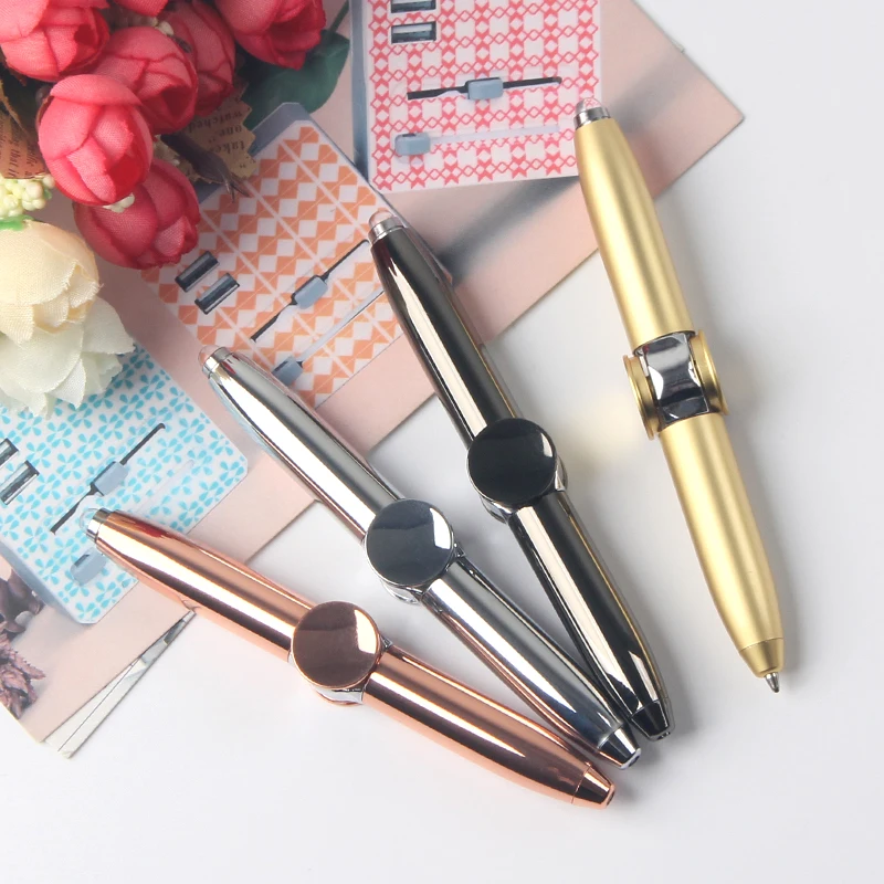 newst design hand spinner pen metal ballpoint pen with light/rotating pens