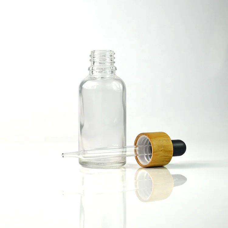 Cosmetic serum packaging 10ml 15ml 30ml 50ml 100ml amber blue green clear glass essential oil dropper bottle with bamboo cap