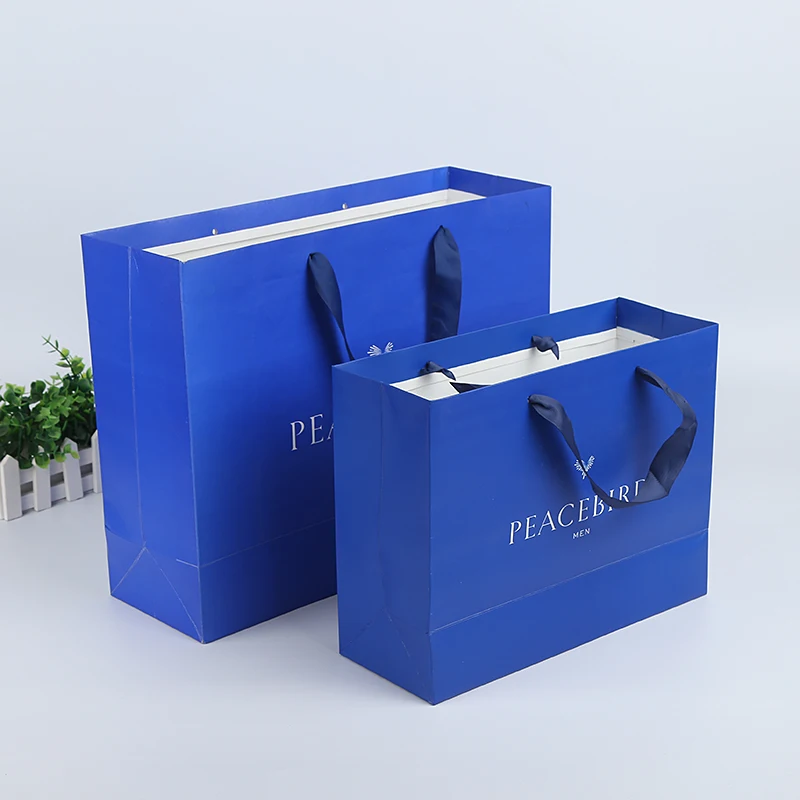 
Индивидуальный дизайн, заводская цена, бумажный пакет с тканевым покрытием для покупок 