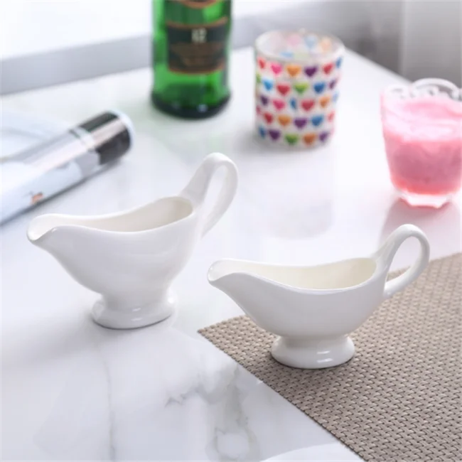 
China suppliers ceramic creamer pot,gravy boat,White Honeycomb Gravy Boat For Sauce Service 