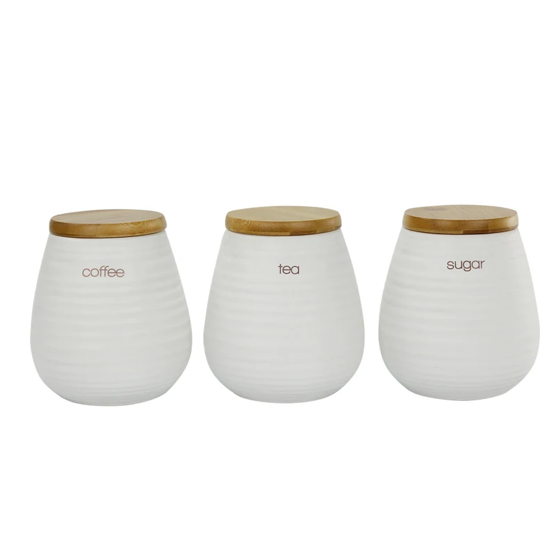 Уникальный набор керамических канистр белого цвета с деревянной крышкой для хранения кофе чая сахара