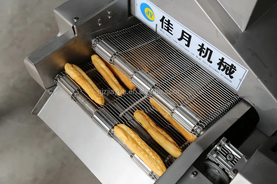 Continuous frying machine for spanish churros dough twist