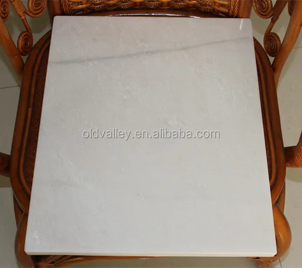 
White marble pastry and cutting board with four felt pad 