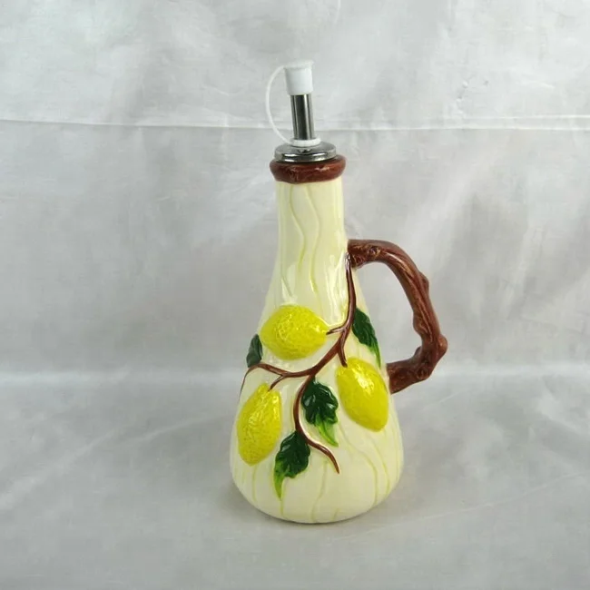 Handpainted ceramic olive oil dispenser with decorative lemon design