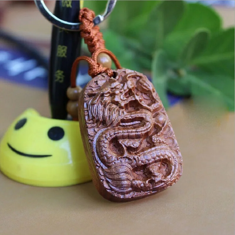 Chinese dragon carved wood keychain