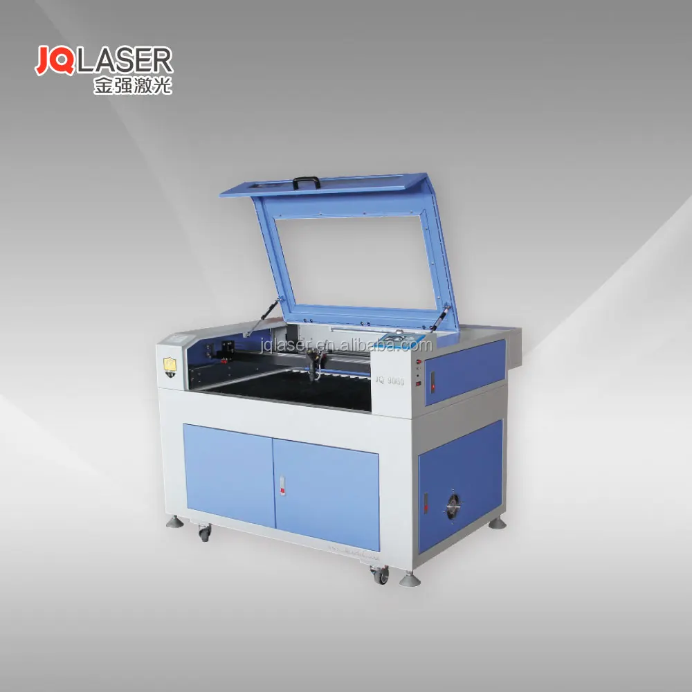 JQ Jinan Jinan Easy operation and hot sale blue and white MDF/wood CO2 laser engraving machine price 2600-3000USD