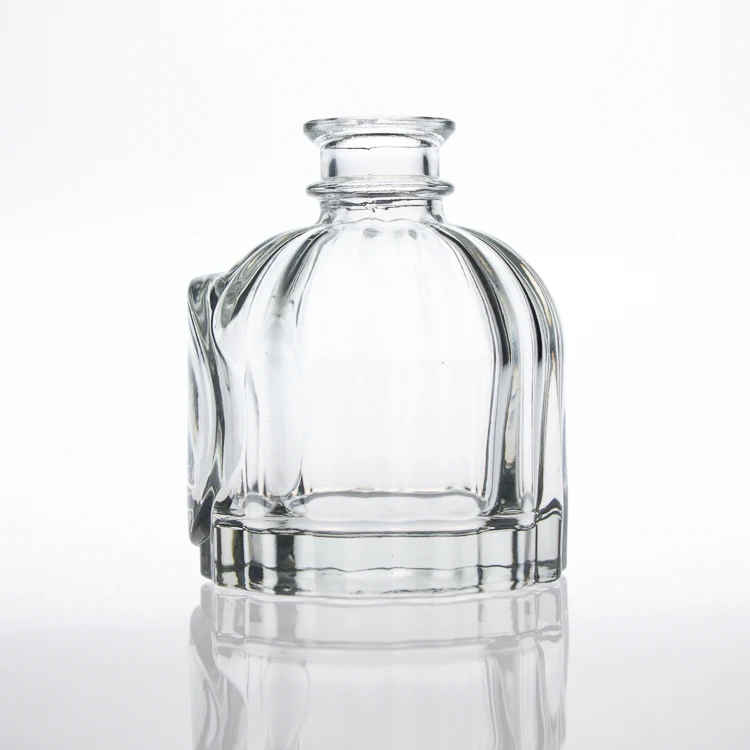 Luxury 100ml Embossed Logo Brand Clear Embossed Perfume Bottle Reed Diffuser Glass Bottle with Reed Rattan