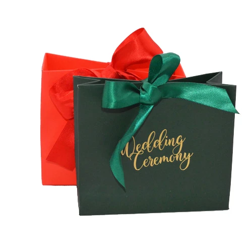 
China Manufactures small White Luxury Carrier Wedding jewelry candy Custom Logo Printed Paper Gift Bag With Handle and ribbon 