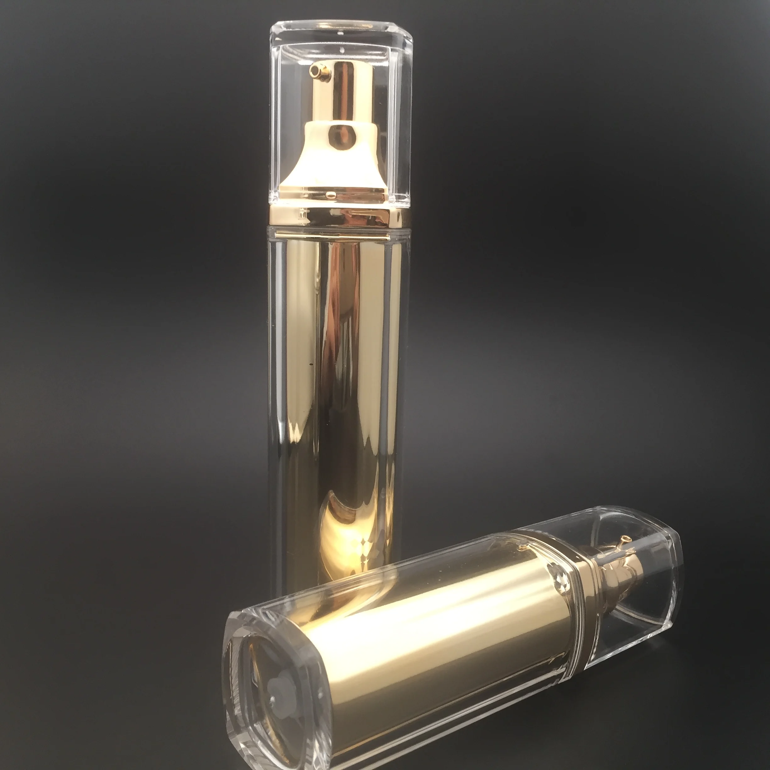 
UV coated gold acrylic airless serum bottle for rectangle shape 