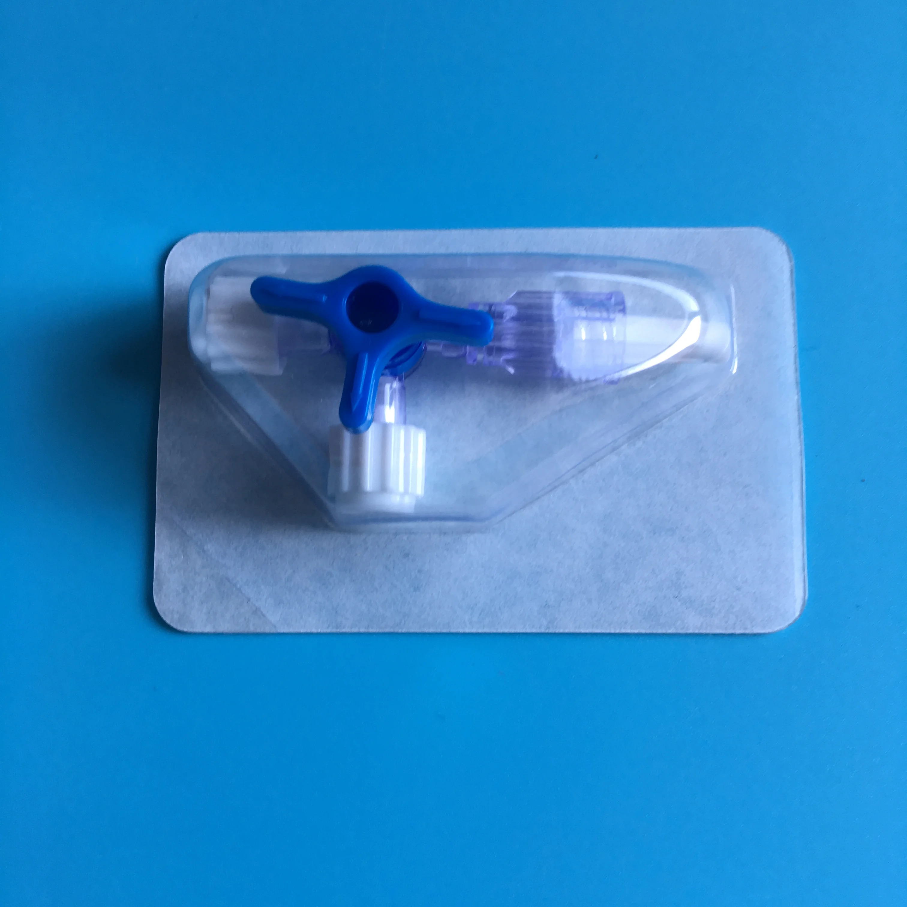 Three way stopcock with two female luer lock one male luer lock