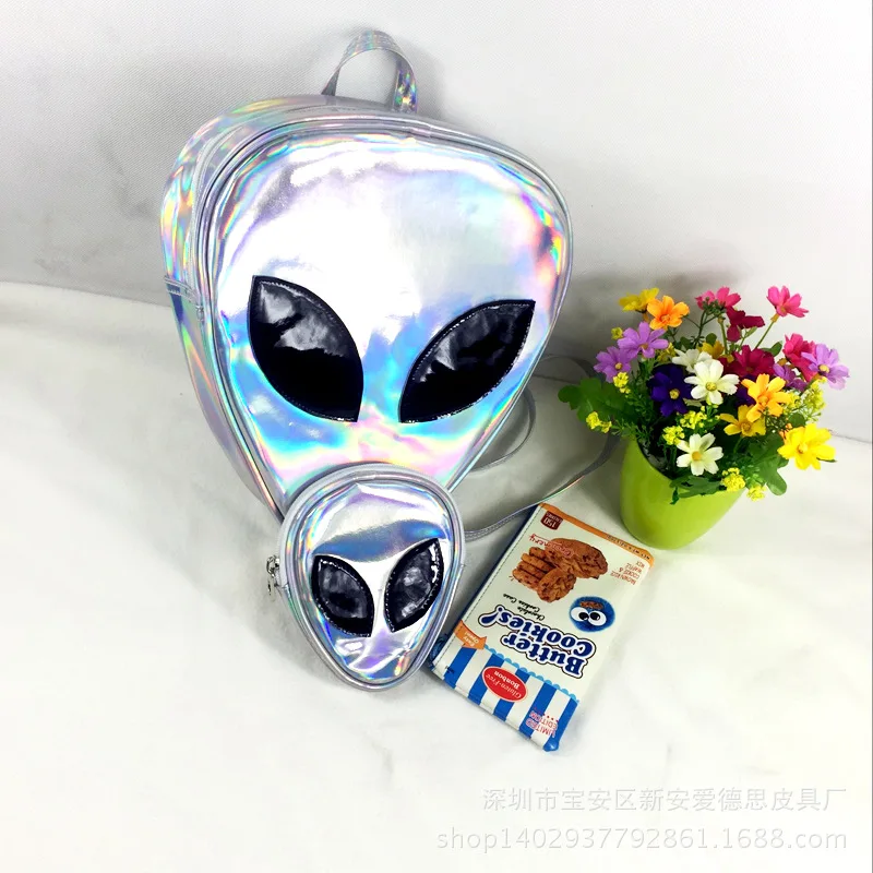New Korean fashion handbags candy color laser transparent laser backpack alien big eye triangle shaped casual bag